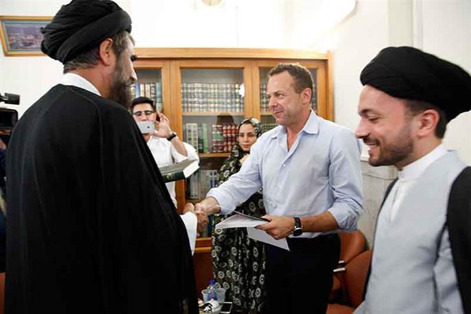An Italian man converts to Islam at Imam Ridha holy shrine on the eve of holy Ramadan